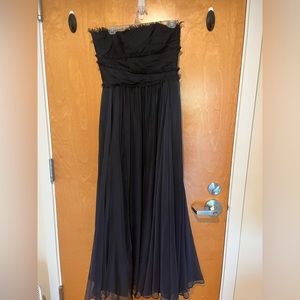 Monique Lhuillier navy blue gown.